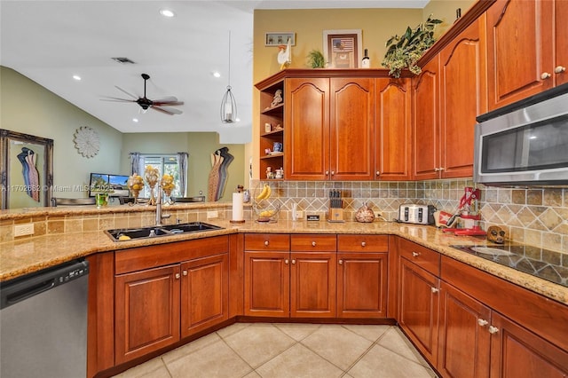 kitchen with a ceiling fan, a sink, light stone counters, stainless steel appliances, and light tile patterned floors