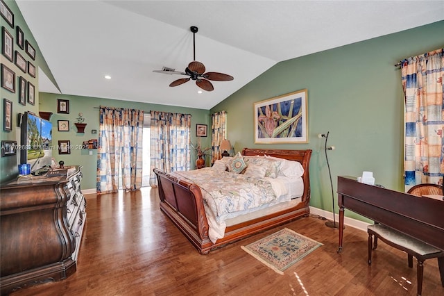 bedroom featuring wood finished floors, recessed lighting, baseboards, ceiling fan, and vaulted ceiling