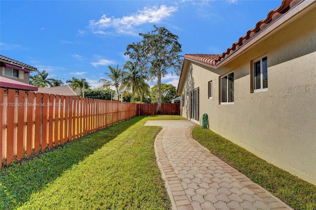 view of yard featuring a fenced backyard