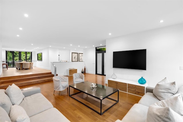 living room with light hardwood / wood-style floors