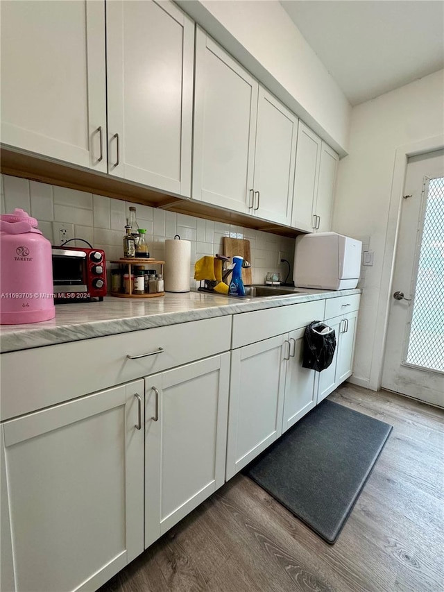 interior space with hardwood / wood-style floors