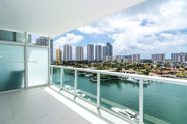 balcony featuring a water view