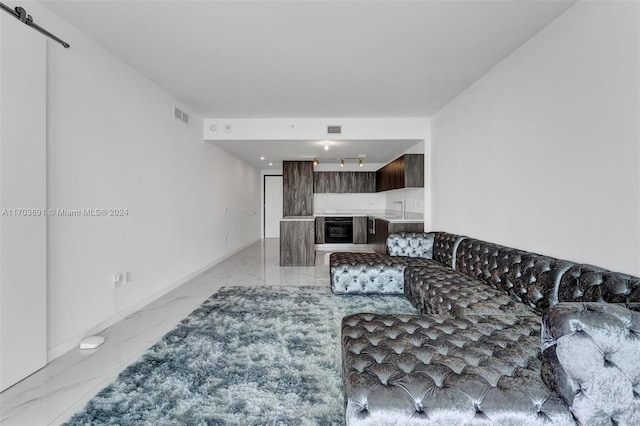 living room with a barn door