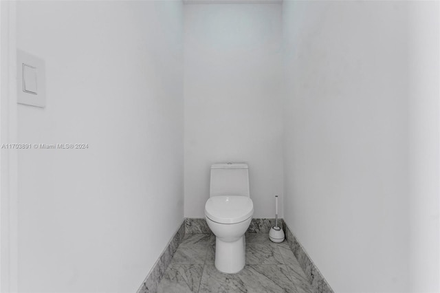 bathroom featuring toilet