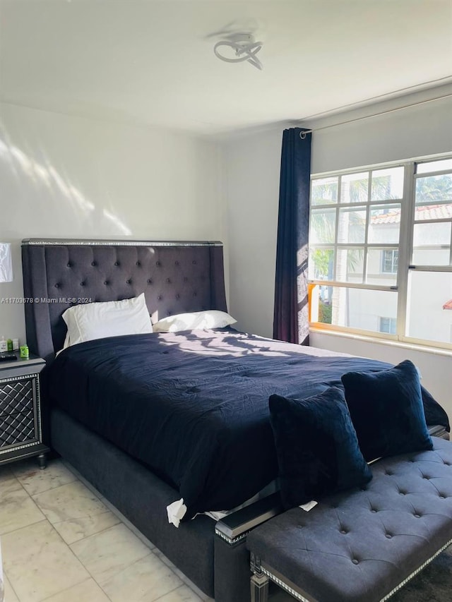 1526 Pennsylvania Ave Unit 14, Miami Beach, FL 33139 - bedroom featuring marble look tile flooring