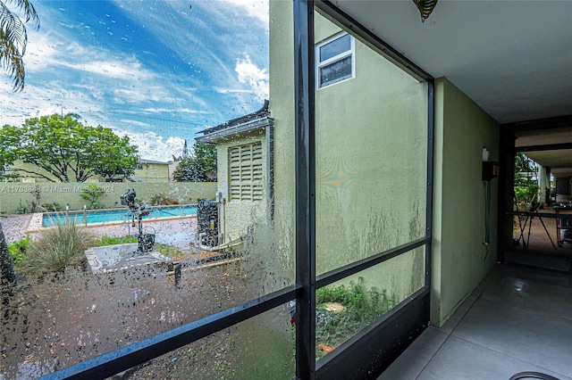 exterior space with a fenced in pool