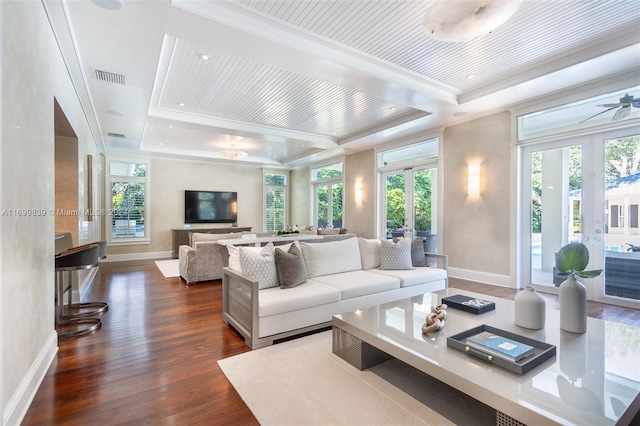 living room featuring dark hardwood / wood-style floors, ceiling fan, crown molding, and french doors