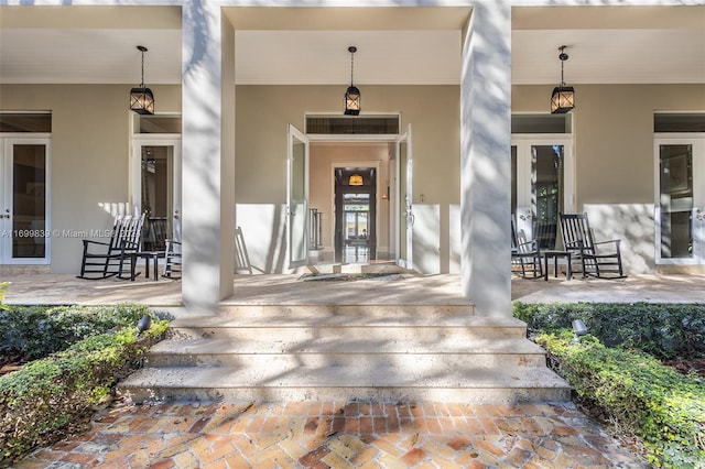 doorway to property with covered porch