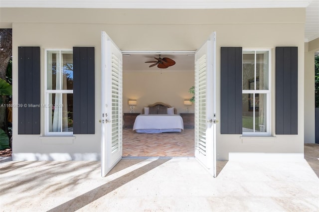 view of patio / terrace featuring ceiling fan