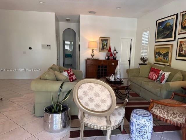 living room with light tile patterned flooring