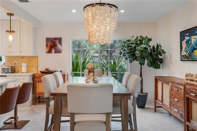 dining area with a chandelier