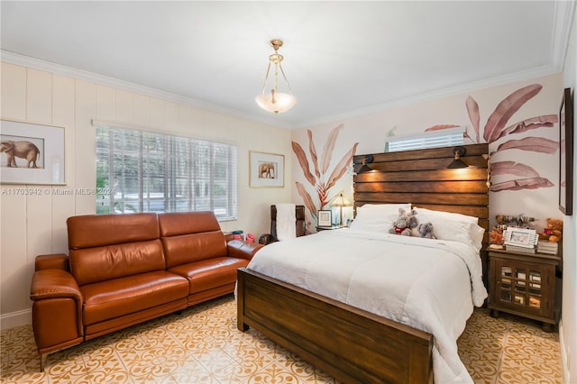 bedroom with ornamental molding and light tile patterned floors