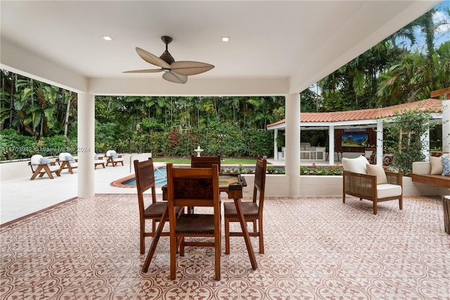 view of patio featuring ceiling fan