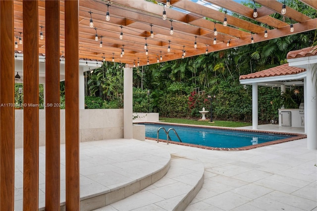 view of pool featuring a patio area and a pergola