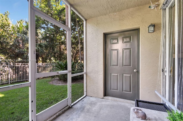 view of unfurnished sunroom