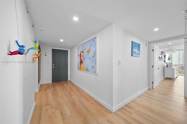 hallway featuring light wood-type flooring