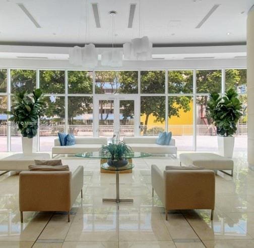 unfurnished sunroom with plenty of natural light