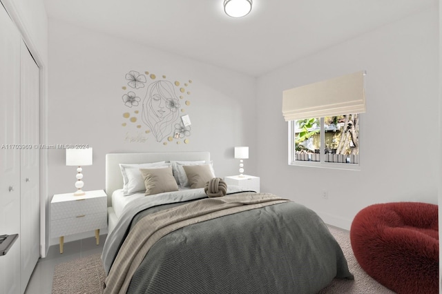 tiled bedroom with a closet