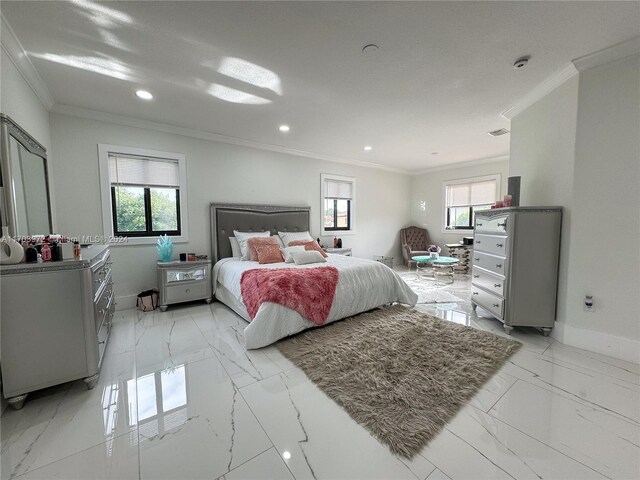 bedroom featuring ornamental molding and multiple windows