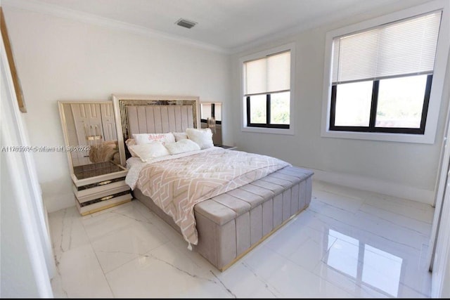 bedroom with crown molding