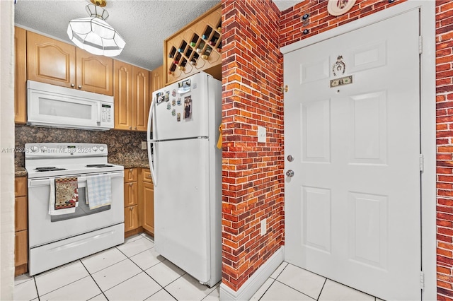 kitchen with backsplash, brick wall, a textured ceiling, white appliances, and light tile patterned floors