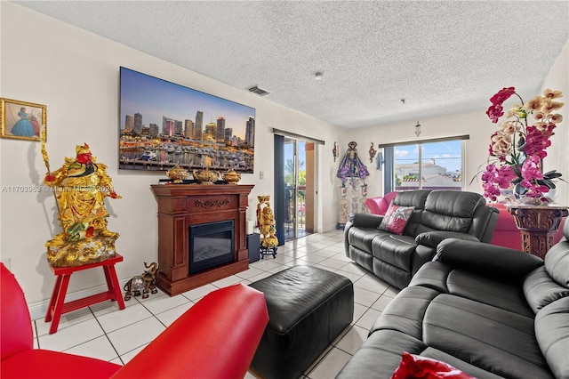 tiled living room with a textured ceiling