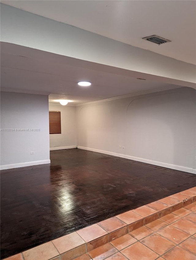 basement featuring light tile patterned flooring