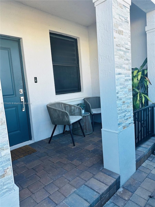 entrance to property with a porch