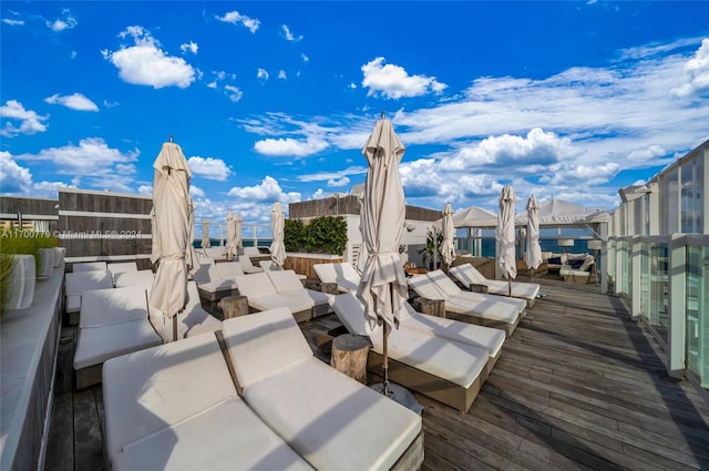 wooden deck with an outdoor hangout area