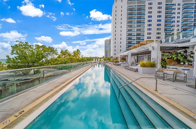 view of pool featuring a patio area