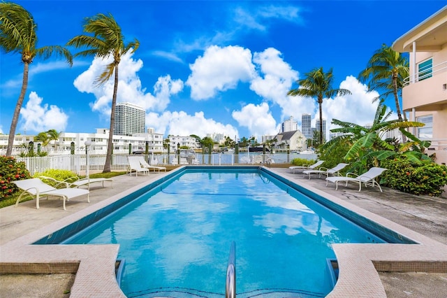 view of swimming pool with a patio area