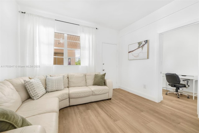 living room with hardwood / wood-style flooring