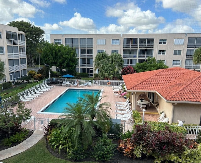 view of swimming pool featuring a patio