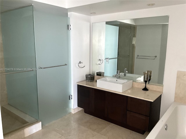 bathroom featuring vanity and plus walk in shower