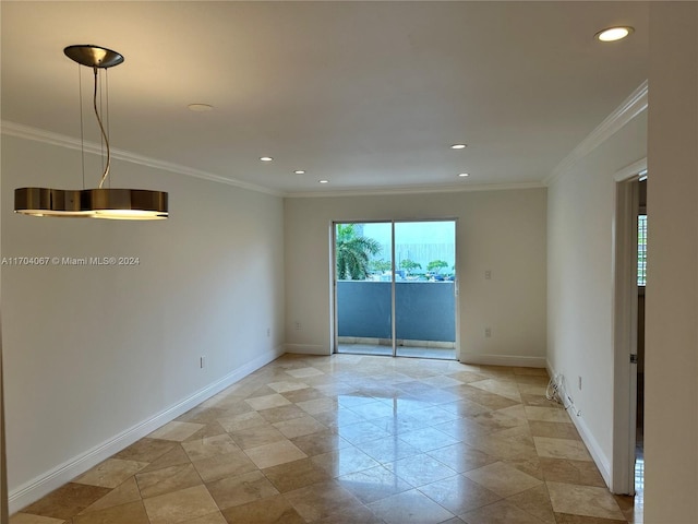 unfurnished room with ornamental molding