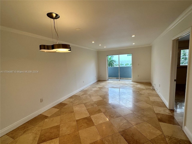 unfurnished room featuring ornamental molding