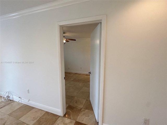 corridor featuring ornamental molding