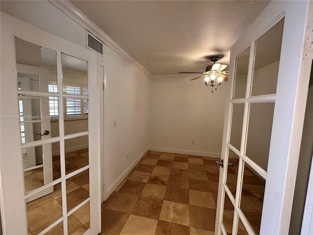 unfurnished room with ceiling fan, crown molding, and french doors