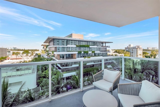 2301 Collins Ave Unit 634/635, Miami Beach, FL 33139 - balcony with a city view and an outdoor hangout area