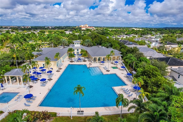 view of swimming pool featuring a patio area