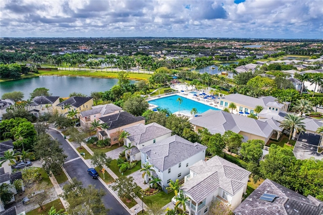 drone / aerial view with a water view