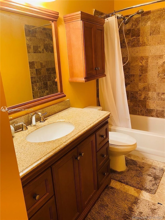 full bathroom featuring vanity, toilet, and shower / bath combo with shower curtain