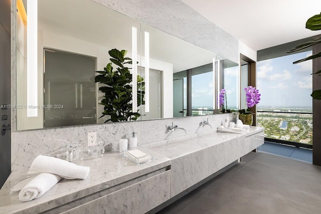 2000 S Ocean Dr Ph 4, Hallandale Beach, FL 33009 - bathroom with tasteful backsplash, double vanity, and expansive windows