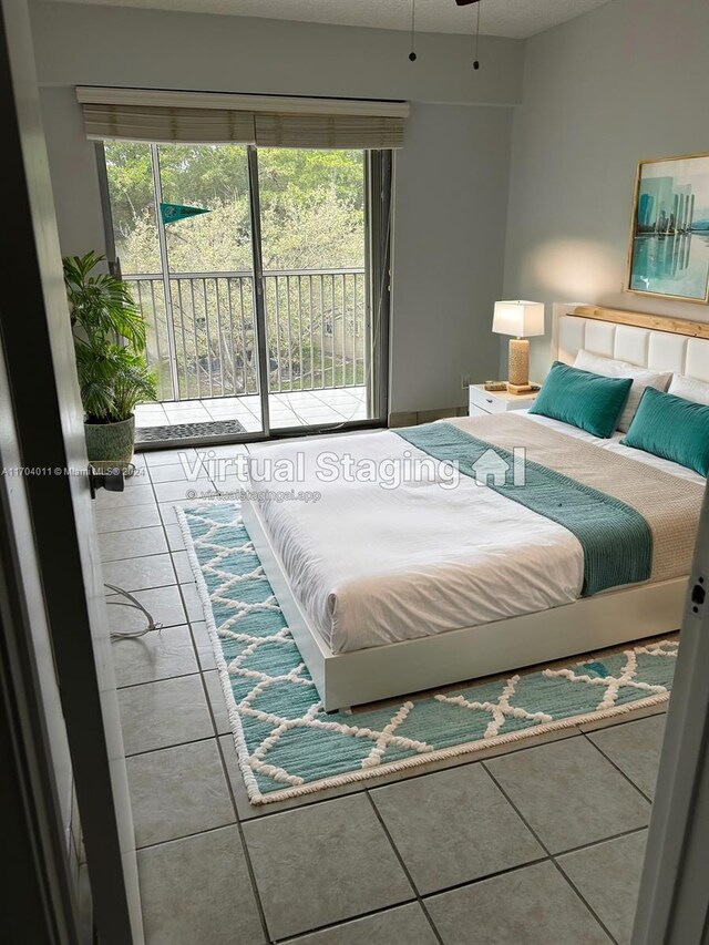 tiled bedroom with access to outside