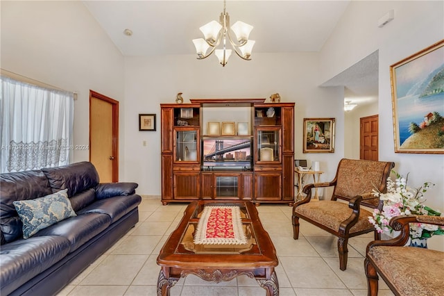 tiled living room with a notable chandelier and lofted ceiling