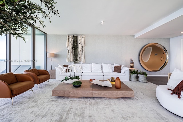 living room with floor to ceiling windows