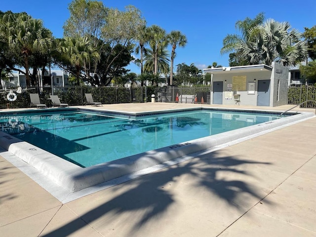 view of swimming pool featuring a patio area