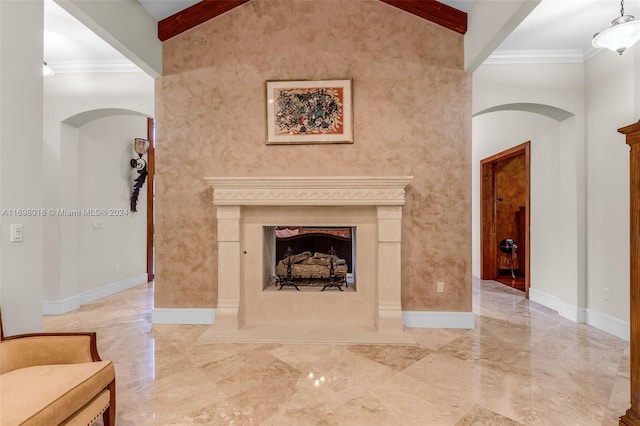 living room with crown molding and lofted ceiling with beams