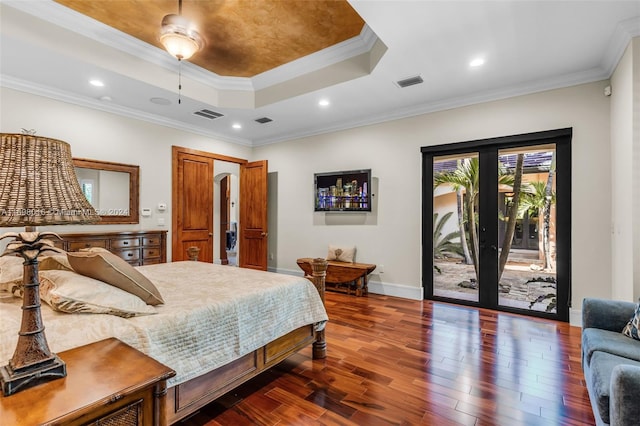 bedroom featuring ceiling fan, dark hardwood / wood-style floors, access to exterior, and ornamental molding