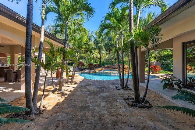 view of swimming pool with a patio